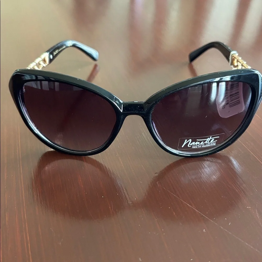 Nanette Lepore 100% UV protection,black butterfly frame,gold chain accent arm
